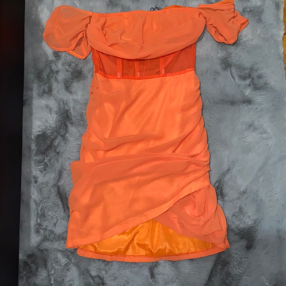 Orange chiffon panel insert drape body con dress.